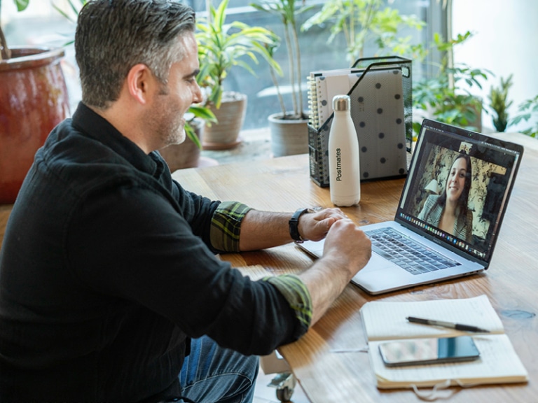 Two colleagues collaborate over a Zoom call