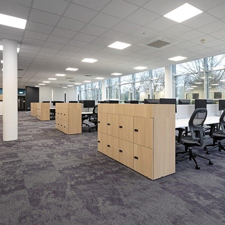 An open office space with furniture but pre re design