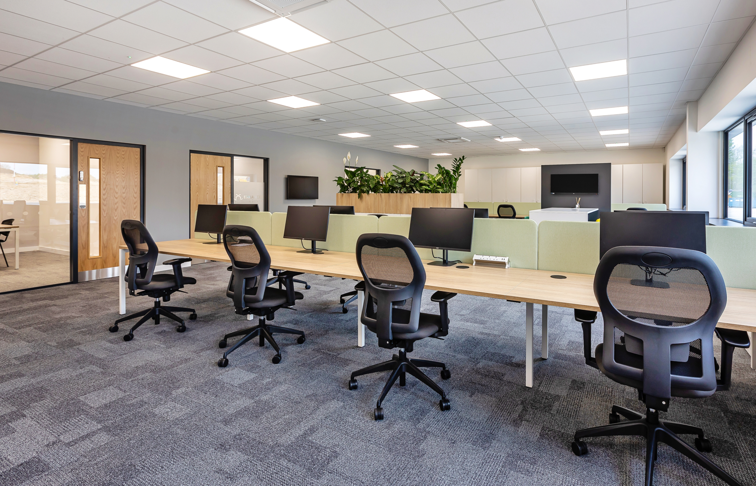 Enhanced care services office area with green and beige tones