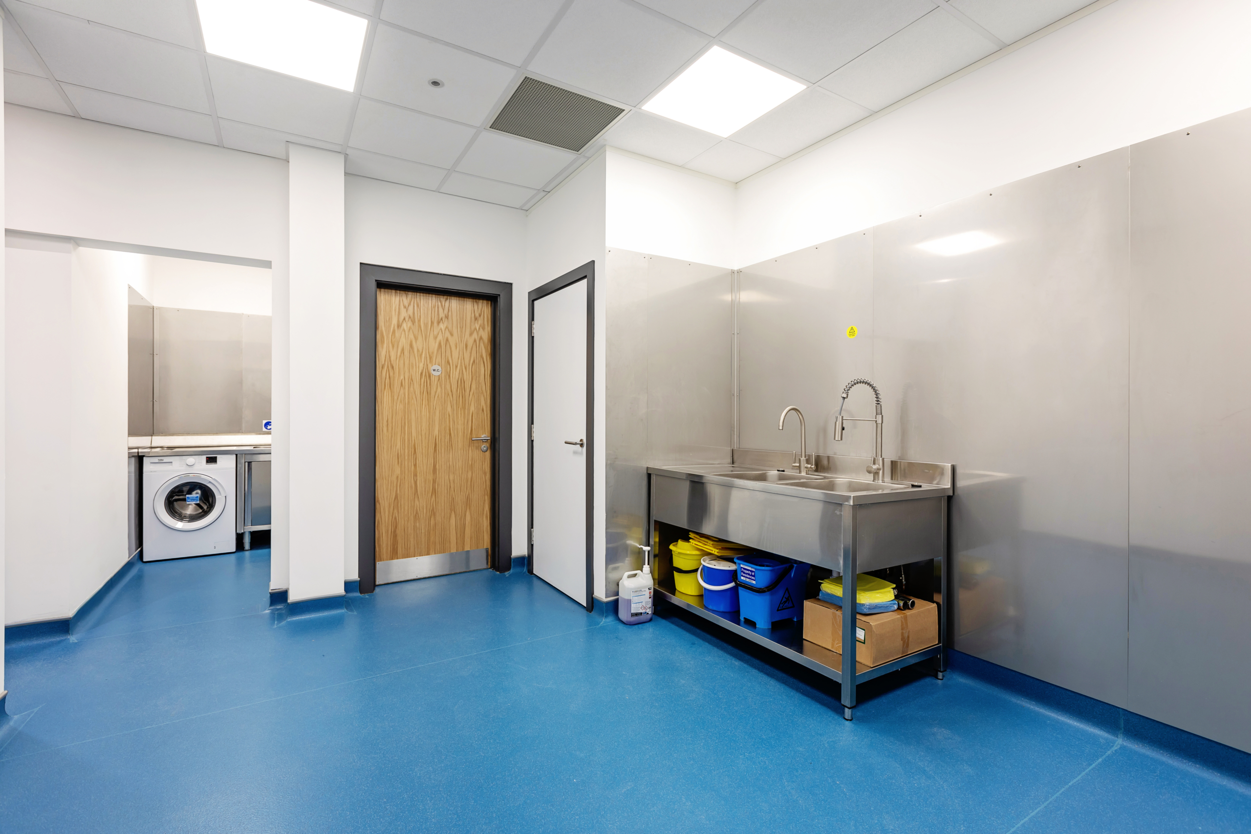 Cleaning facilities room with chemical products