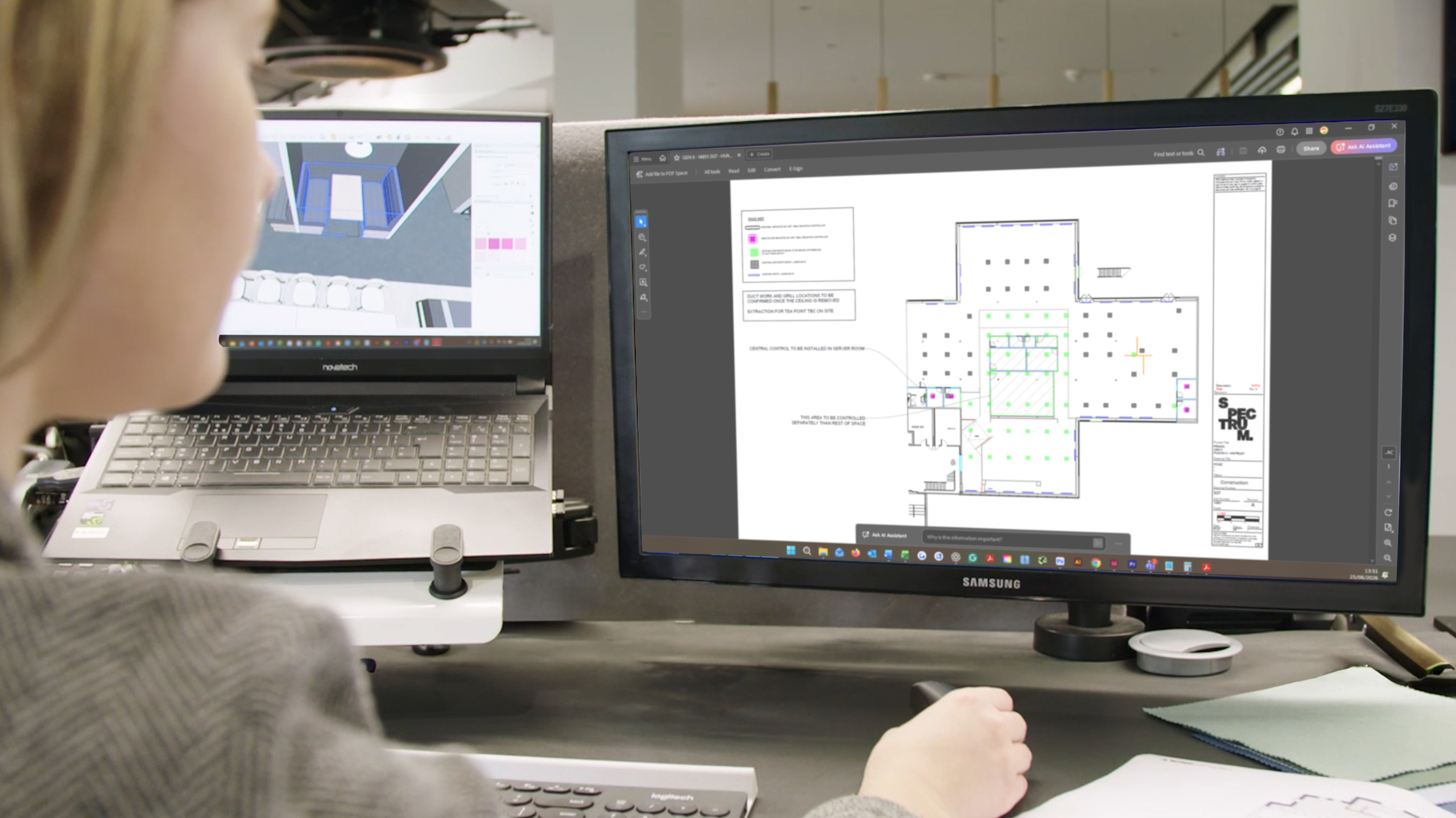 Girl looking at a layout plan on computer screen